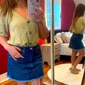 Francesca’s beige blouse